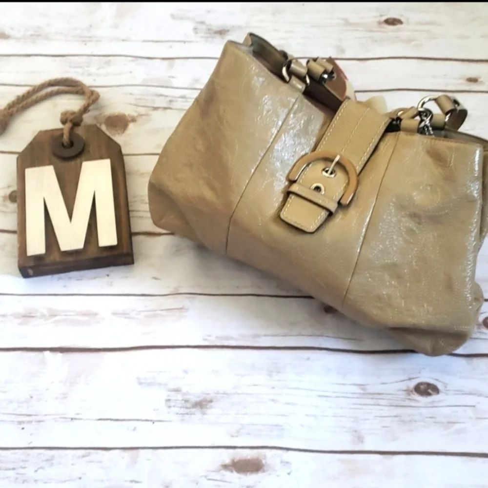 Coach Soho tan stitched satchel with buckle front accent